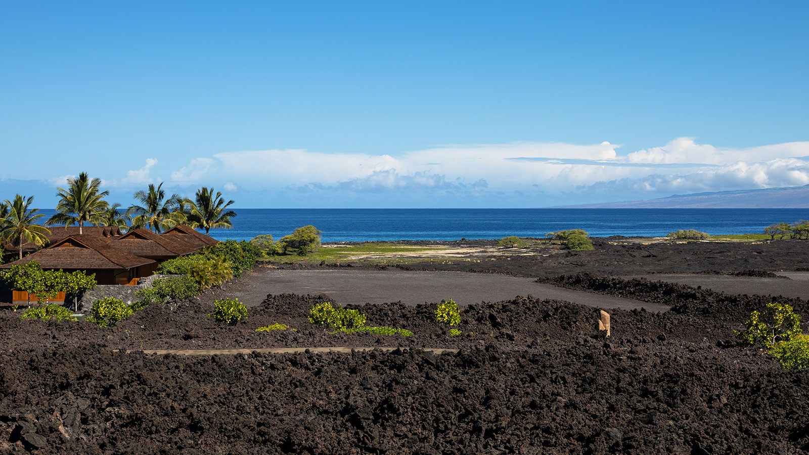 Kupuna (elders) tell of playing, working, and fishing in the waters seen here at Kaupulehu (courtesy of the Kona historical Society)