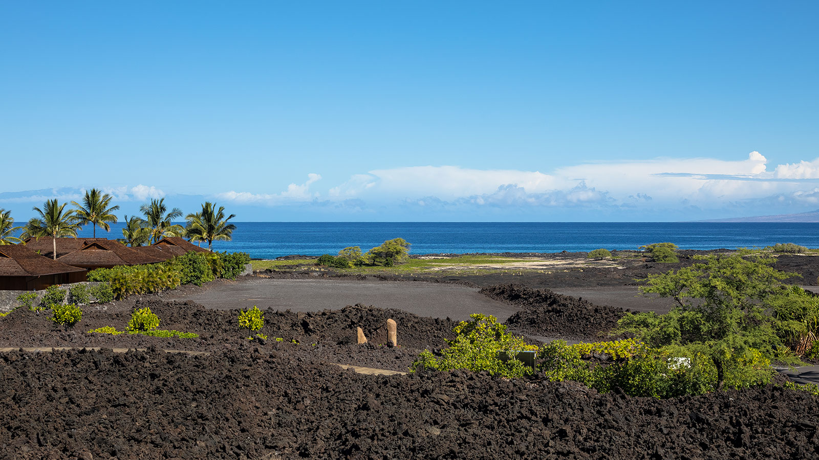 Dramatic geography features lava fields rolling out across big island Hawaii