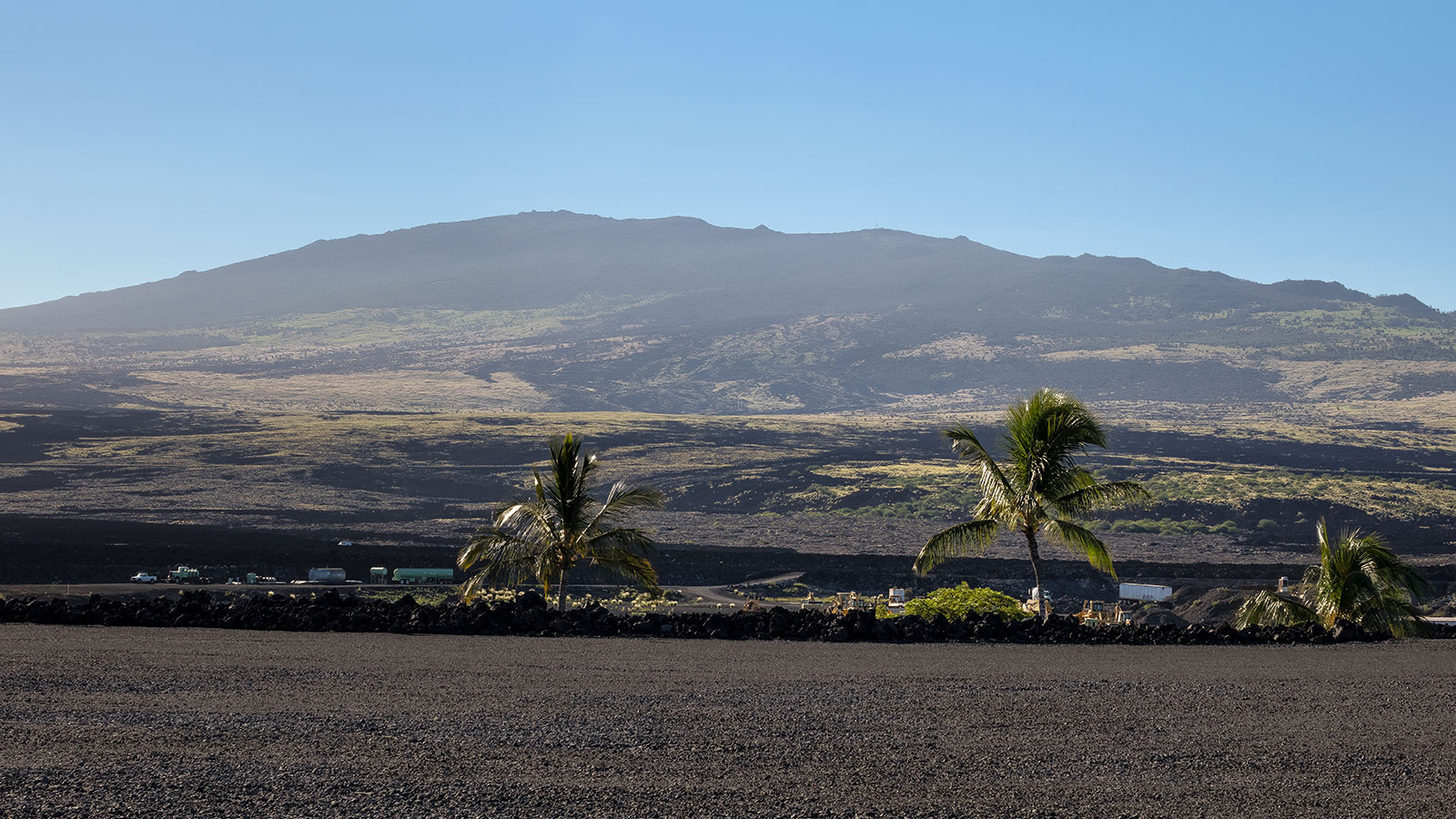 Dramatic geography features lava fields rolling out across big island Hawaii