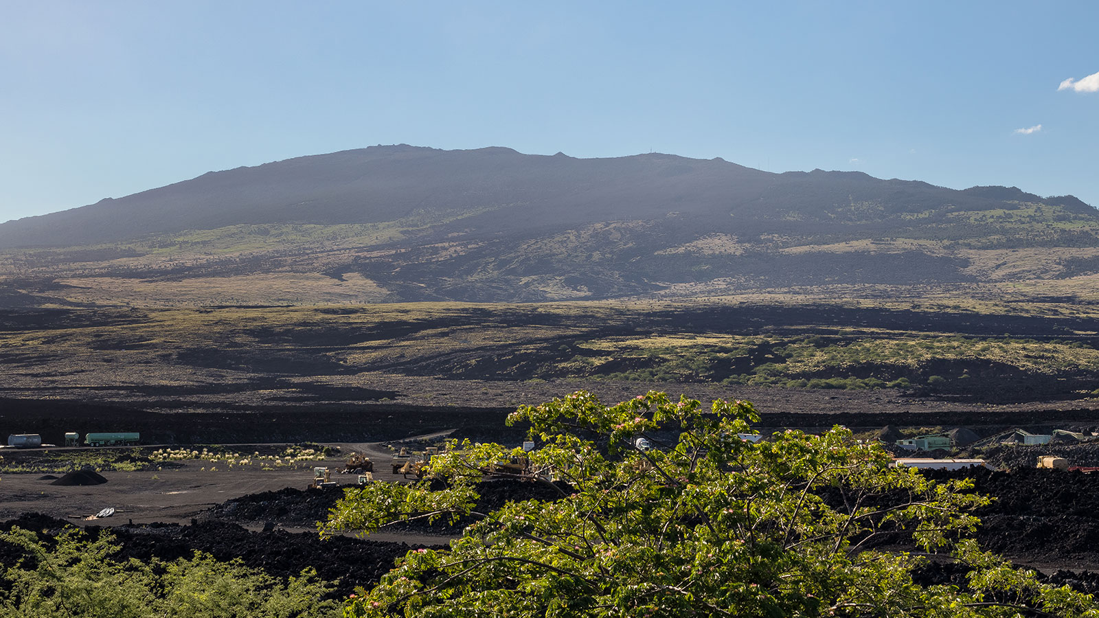 Dramatic geography features lava fields rolling out across big island Hawaii