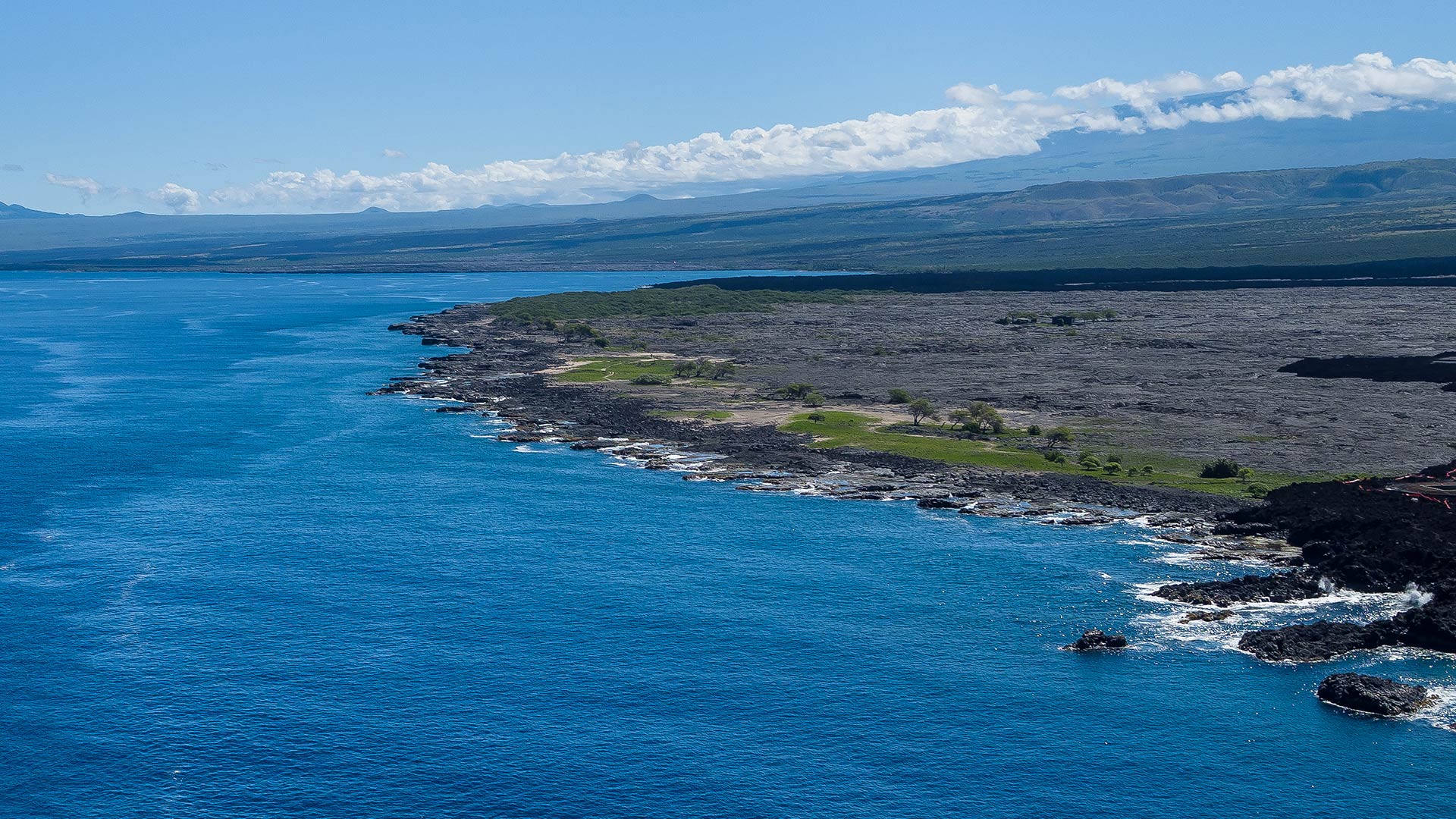 Lava fields on the rugged coastline of big island Hawaii