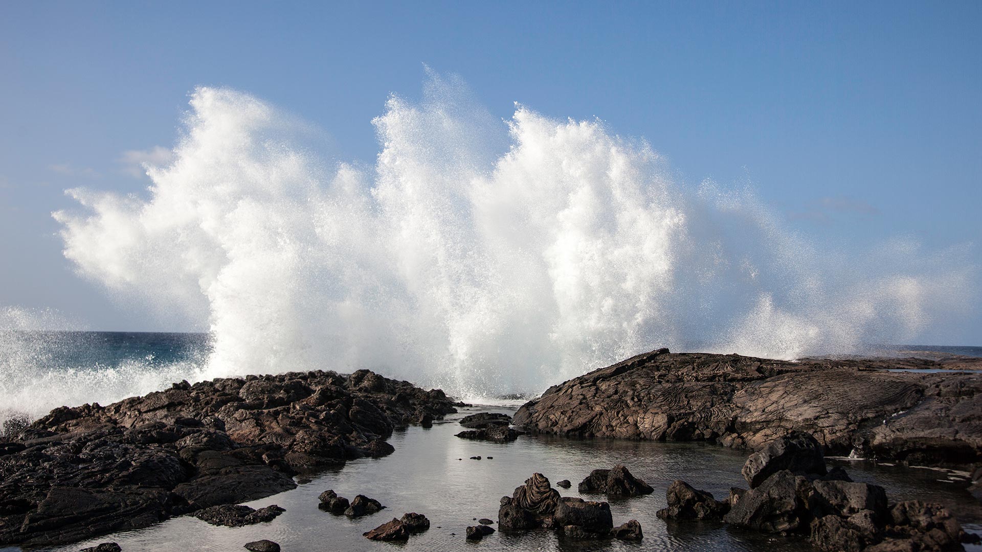 Dramatic geography features lava fields rolling out across big island Hawaii