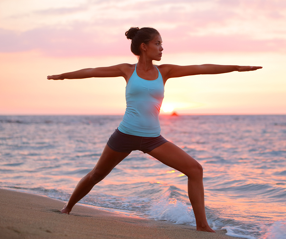 Practice yoga on the shores of big island Hawaii